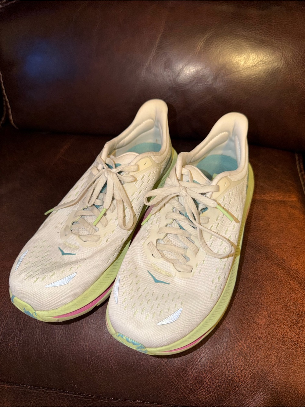 Hoka Women's Cream Running Shoes with Pastel Green and Light Blue Accents